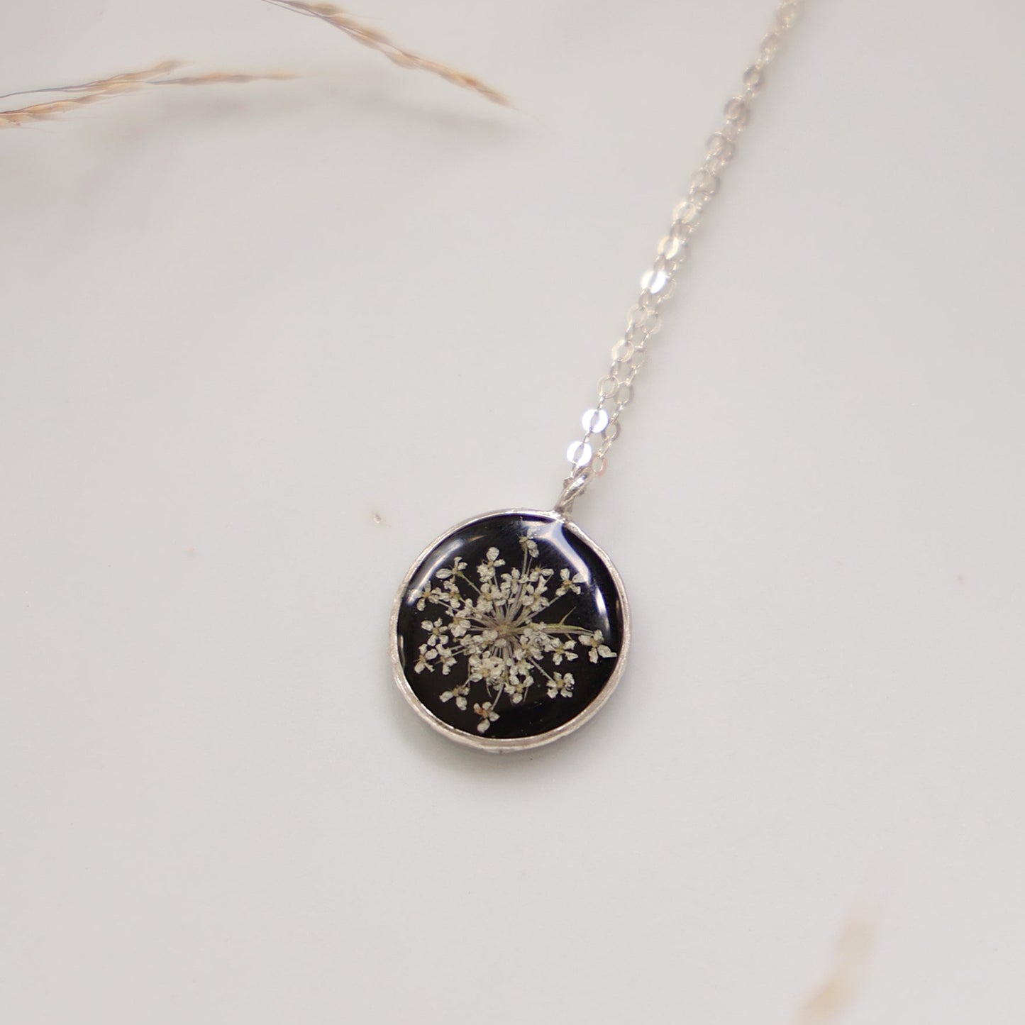 Round necklace with Wild Carrot flower