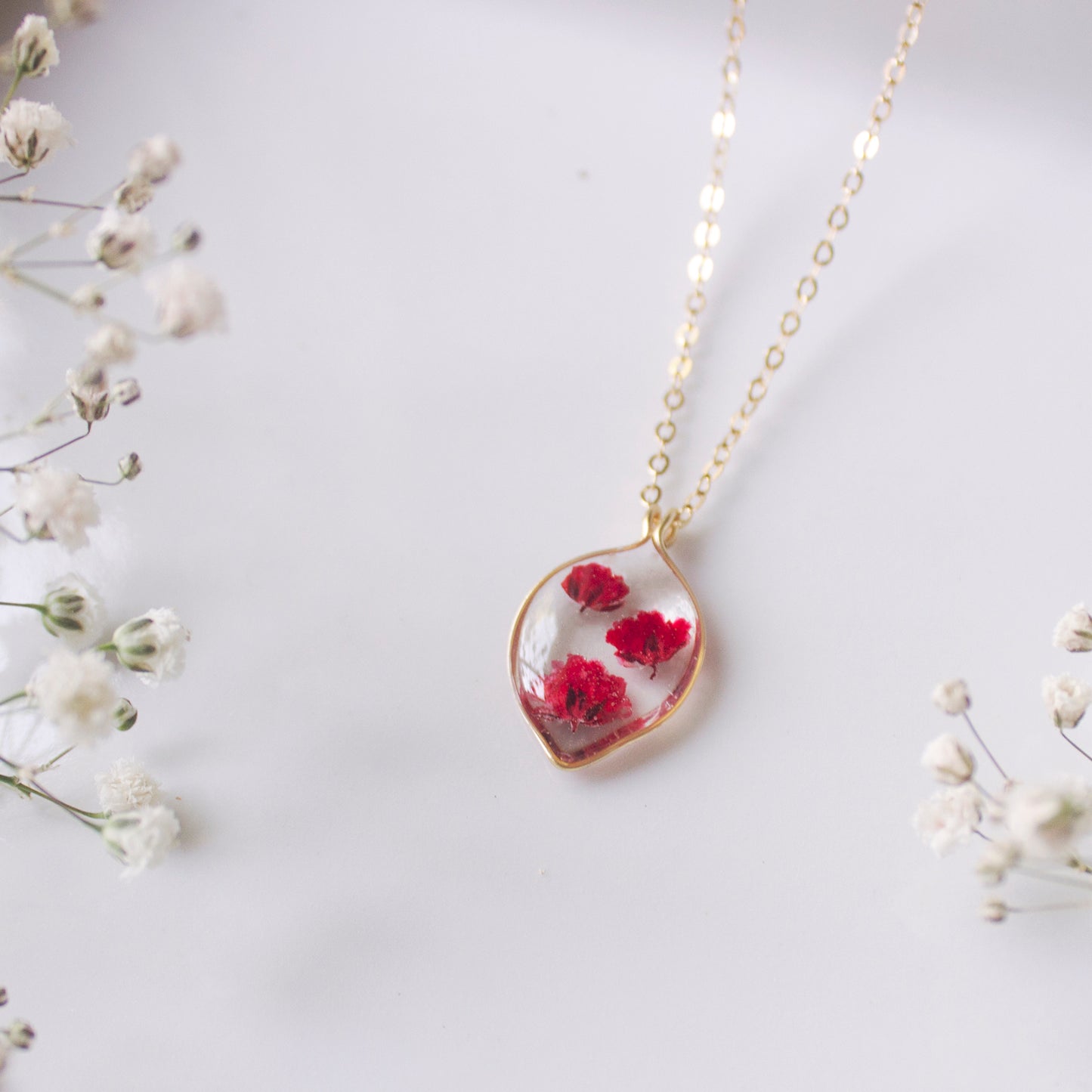 Teardrop necklace with red Gypsophila flowers