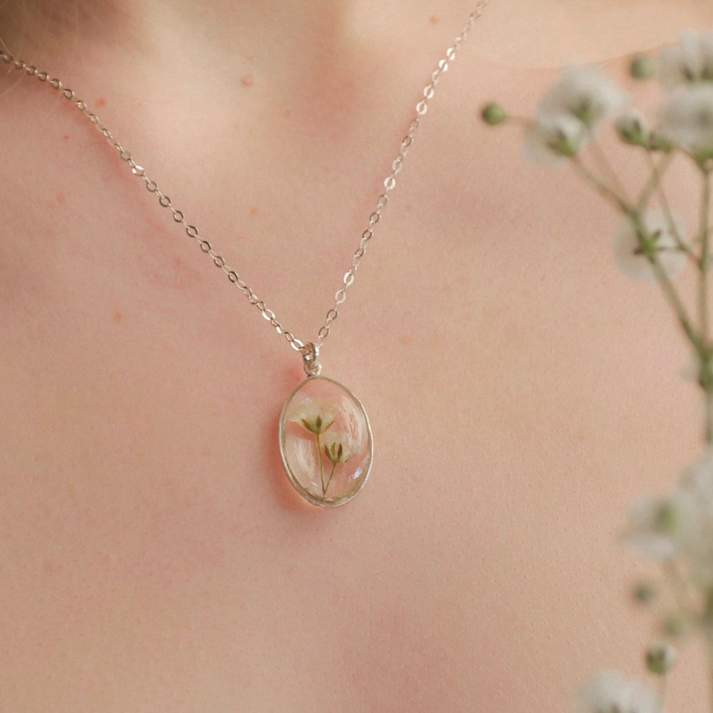 Oval necklace with Gypsophila flowers