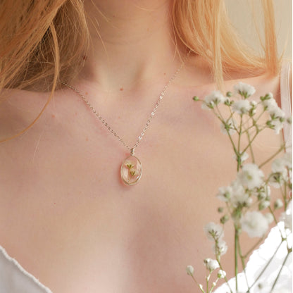 Oval necklace with Gypsophila flowers