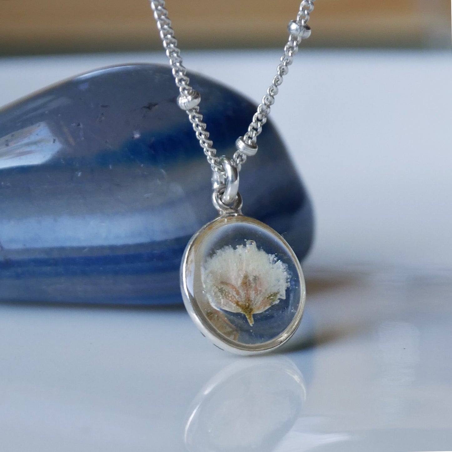 Small round necklace with Gypsophila flower
