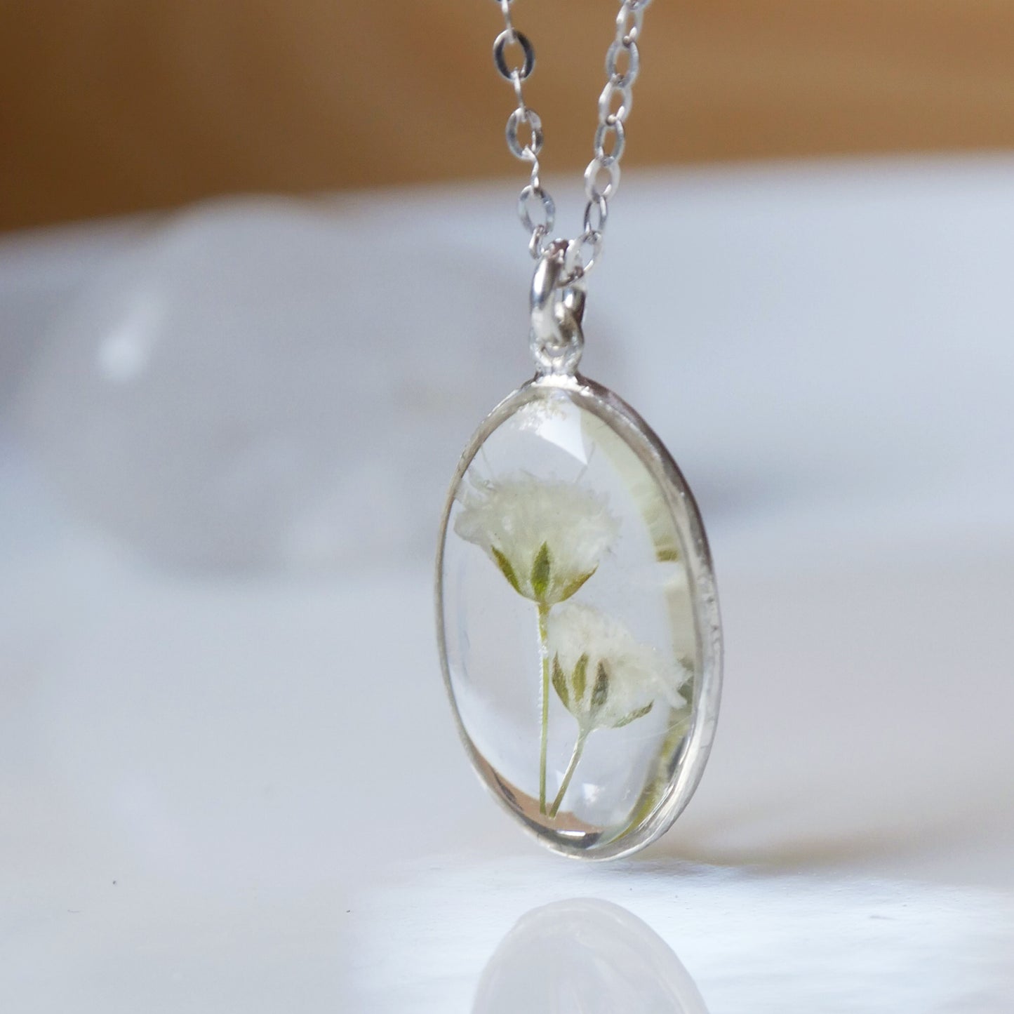 Oval necklace with Gypsophila flowers