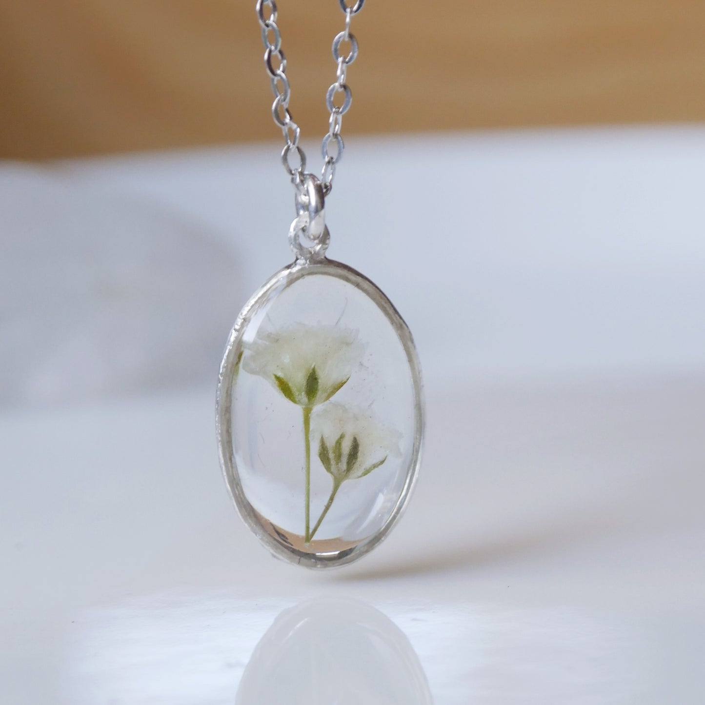 Oval necklace with Gypsophila flowers