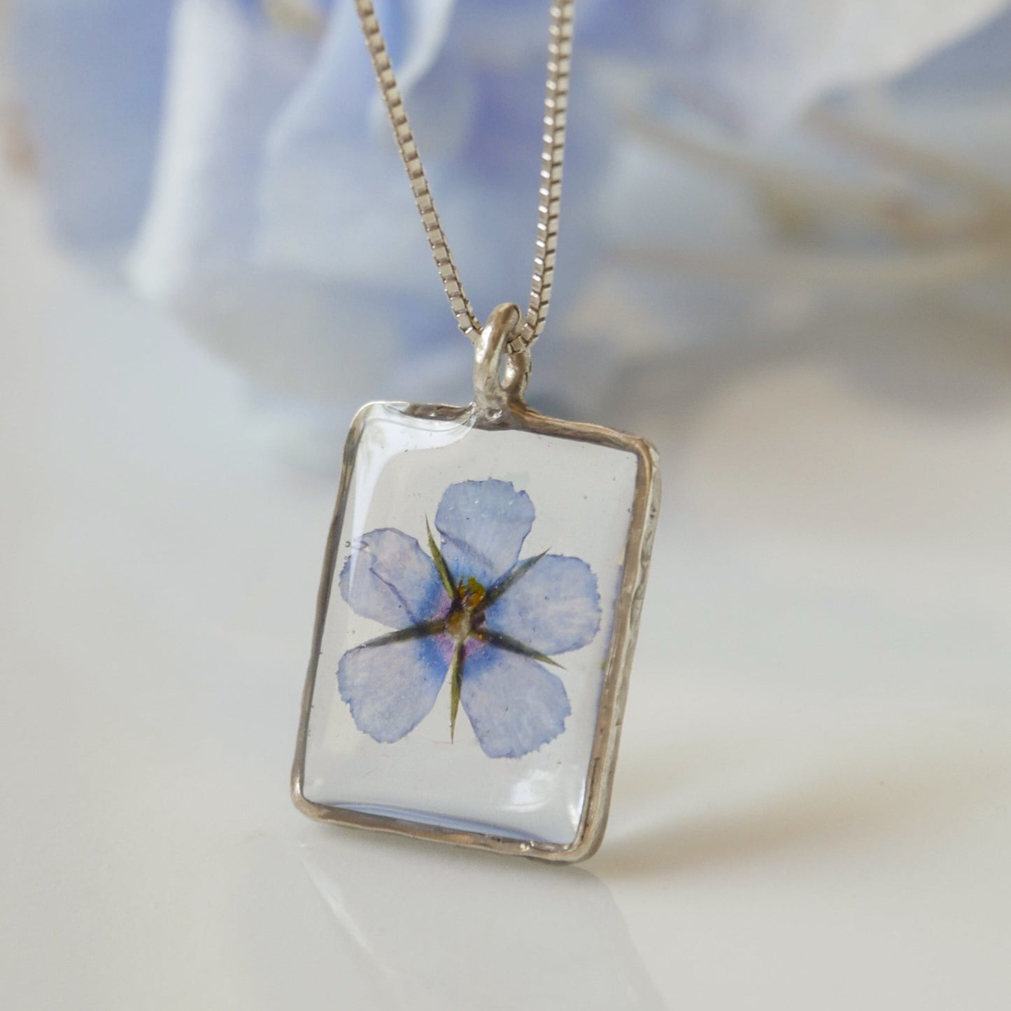 Rectangle necklace with Scarlet Pimpernel flower