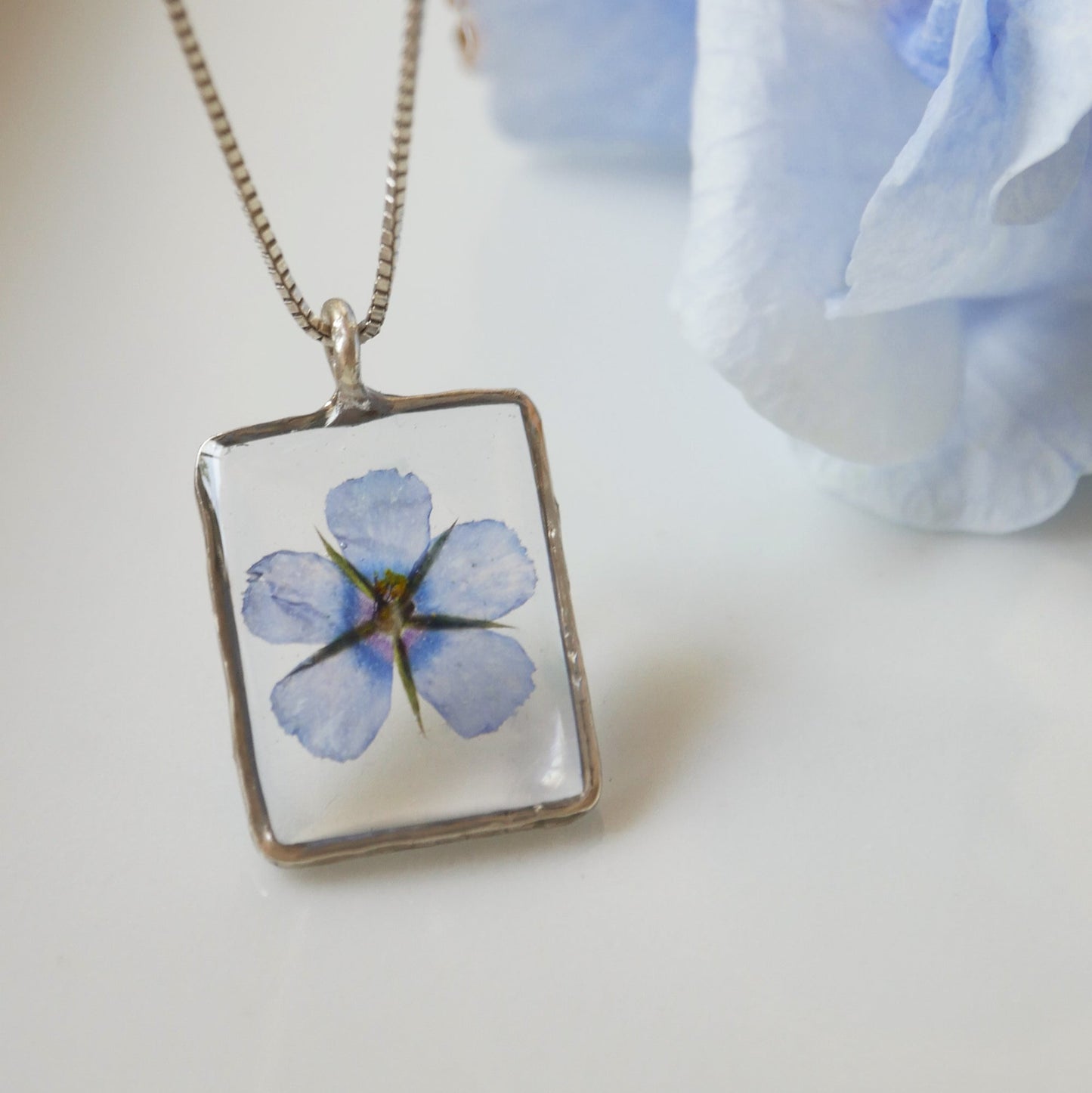 Rectangle necklace with Scarlet Pimpernel flower